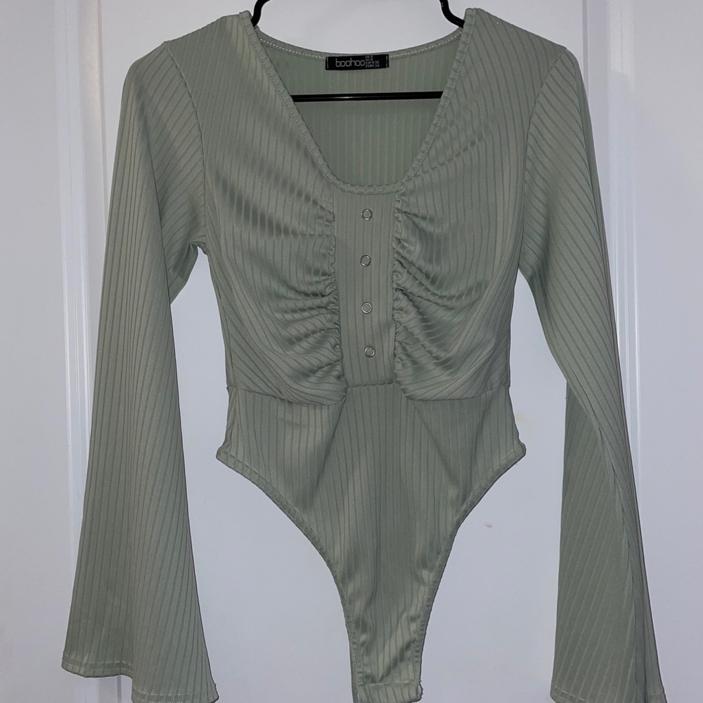 Glared body suit